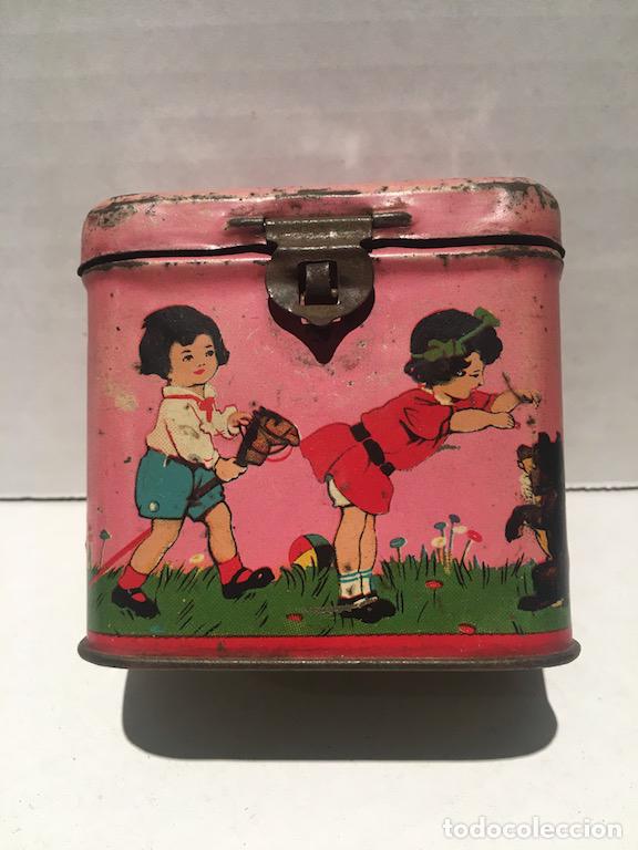 Cajas y cajitas met&aacute;licas: ANTIGUA CAJA HUCHA DE CHAPA Y HOJALATA PUBLICIDAD DE SUCHARD