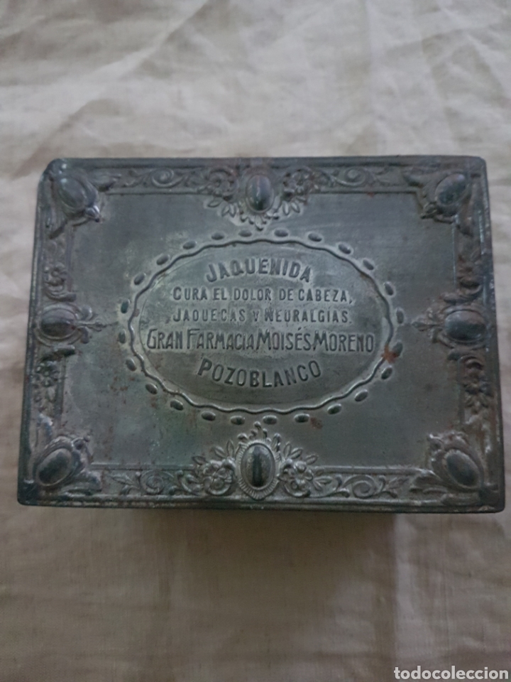 Cajas y cajitas met&aacute;licas: Antigua lata jaquenida Farmacia Moises Moreno Pozoblanco principios de 1900