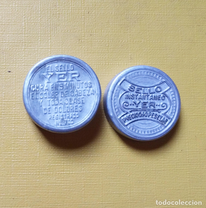 Bo&icirc;tes et petites bo&icirc;tes m&eacute;talliques: Sello instantaneo YER. Farmacia 2,7 cms diam x 1,4 alto. Aluminio con relieve... Vell i Bell.