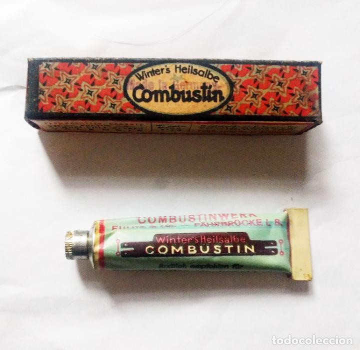 Bo&icirc;tes et petites bo&icirc;tes m&eacute;talliques: Farmacia. COMBUSTIN.. Caja y tubo pomada.. Dr Miguel Gil Cervera.Valencia, 8 x 1,6cms. . Vell i Bell