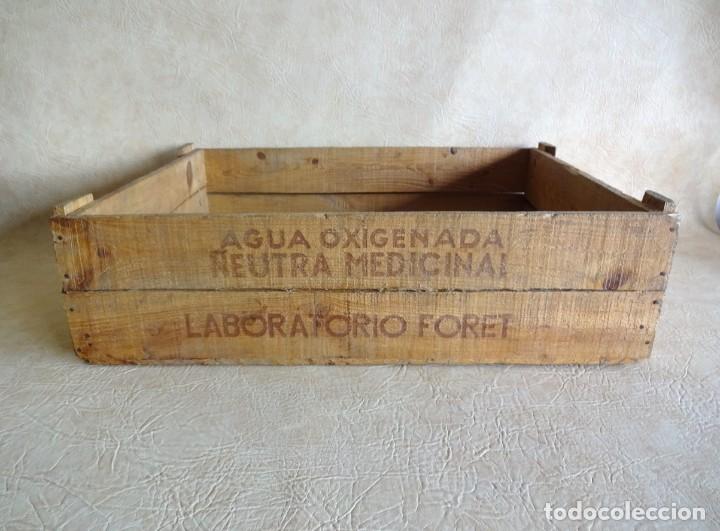 Cajas y cajitas met&aacute;licas: antigua caja de madera de agua oxigenada neutra foret
