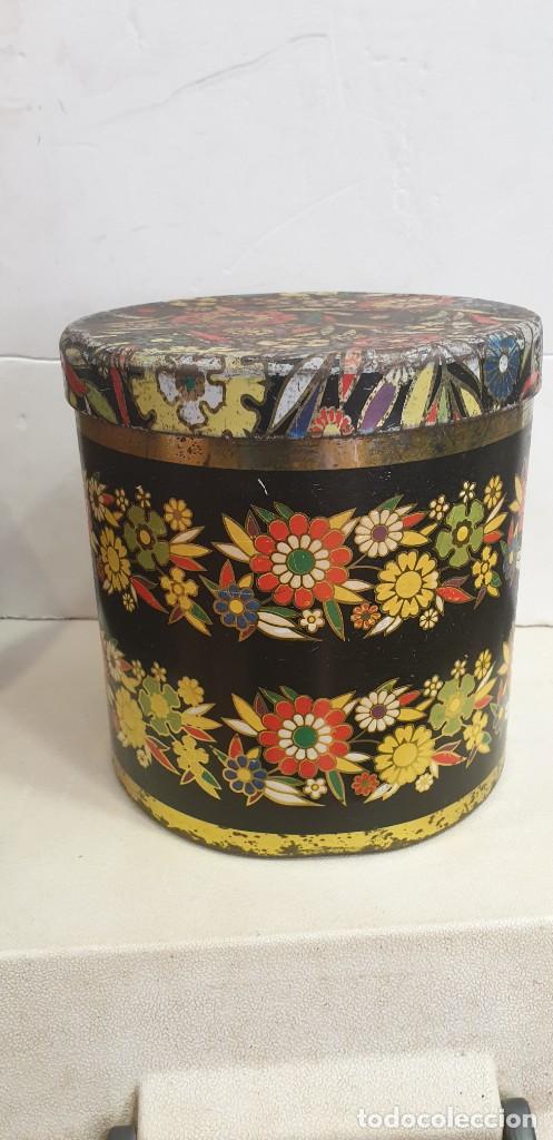 Cajas y cajitas met&aacute;licas: Caja de hojalata de cola cao redonda litografia en colores