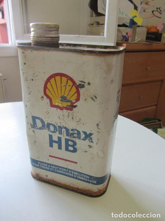 Cajas y cajitas met&aacute;licas: ANTIGUA CAJA DE HOJALATA, LATA DE SHELL LIQUIDO DE FRENOS DONAX HB LLENA SIN ABRIR .