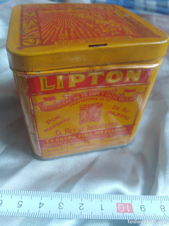 Antigua lata de te lipton 591