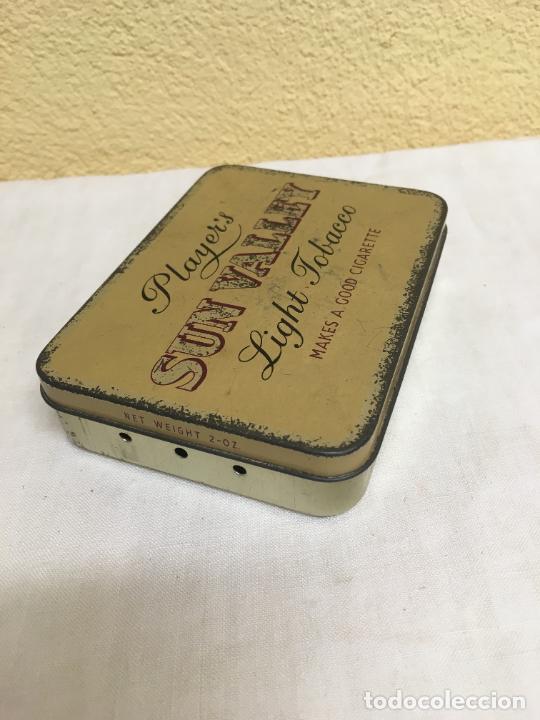 Bo&icirc;tes et petites bo&icirc;tes m&eacute;talliques: Lata tabaco Sun Valley