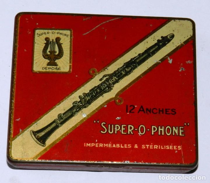 Casse e cassette metalliche: CAJA DE HOJALATA CON PUBLICIDAD LITOGRAFIADA DE 12 ANCHES SUPER-O-PHONE IMPERMEABLES & STERILIS&Eacute;ES,