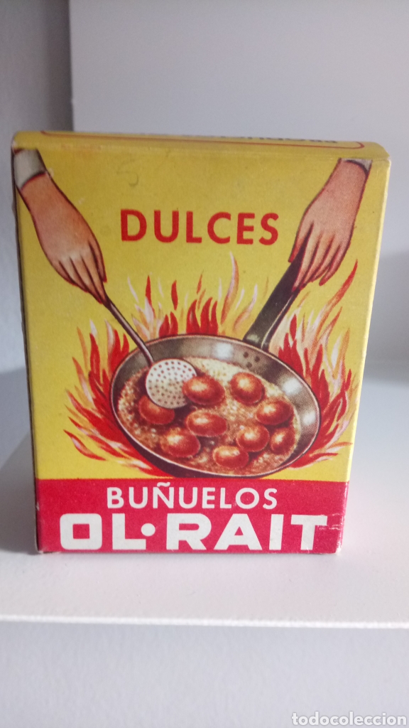 Cajas y cajitas met&aacute;licas: CAJA DE CART&Oacute;N VAC&Iacute;A DE BU&Ntilde;UELOS DULCES OL-RAIT. PVP 5,20 PESETAS.