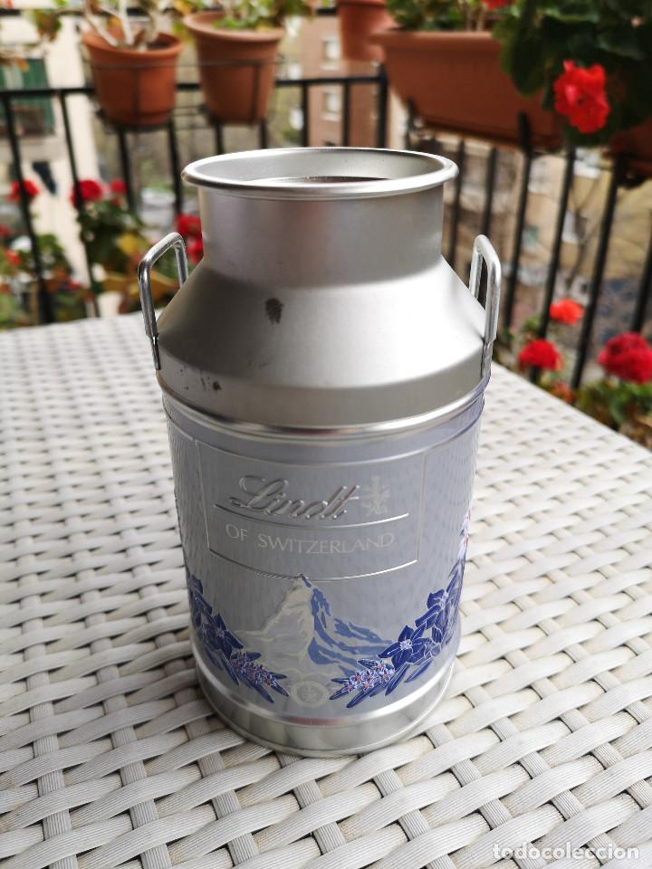 Caixas e caixinhas met&aacute;licas: CAJA METALICA - LINDT Chocolates - En forma de LECHERA