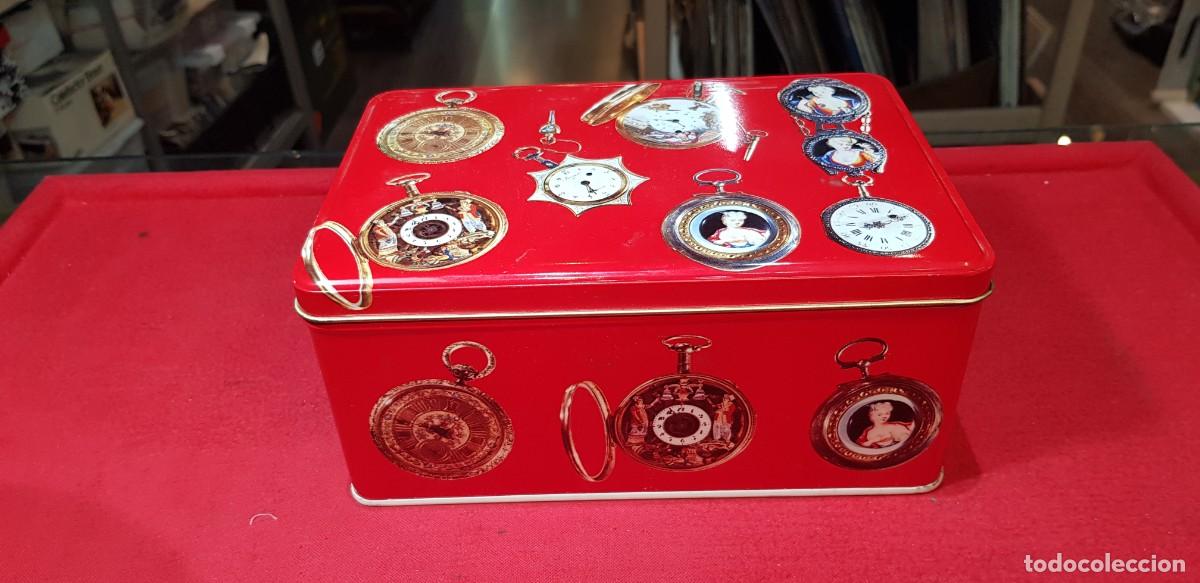 Cajas y cajitas met&aacute;licas: Caja Cola Cao relojes bolsillo buen estado