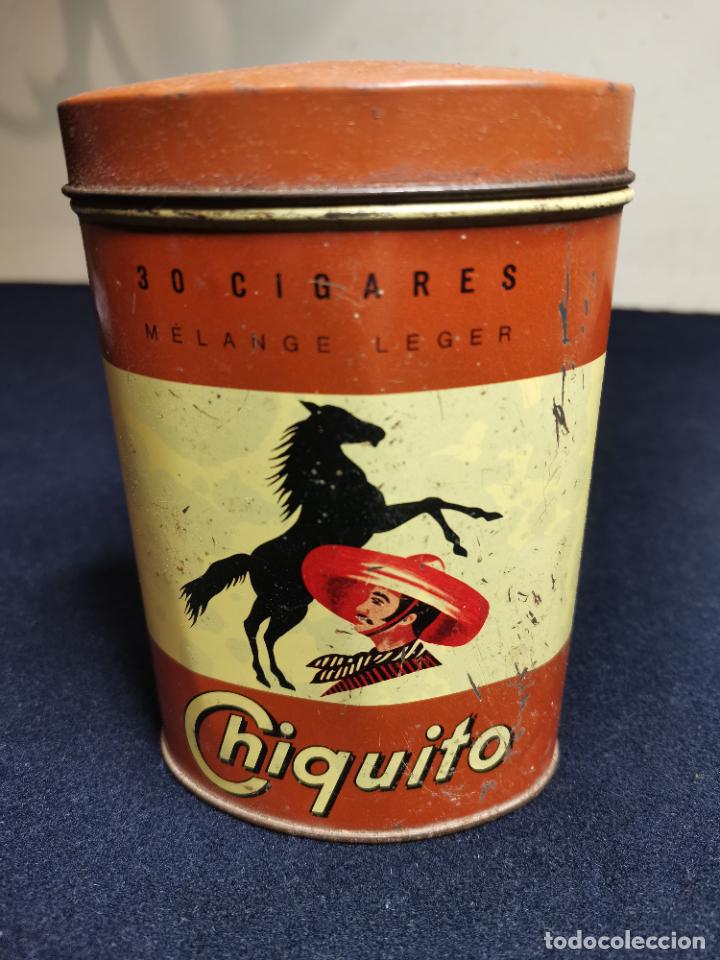 Cajas y cajitas met&aacute;licas: VIEJA LATA DE TABACO CHIQUITO - Foto 2