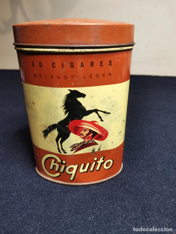 Cajas y cajitas met&aacute;licas: VIEJA LATA DE TABACO CHIQUITO - Foto 1