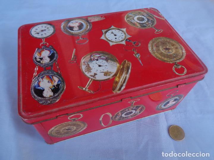 Cajas y cajitas met&aacute;licas: ANTIGUA LATA DE COLA-CAO CON RELOJES