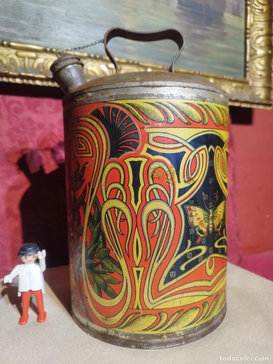 Cajas y cajitas met&aacute;licas: LATA ENVASE 4 LITROS DE ACEITE PURO DE OLIVA - LITOGRAFIADA CON MOTIVOS FLORALES PALMERA MARIPOSA -