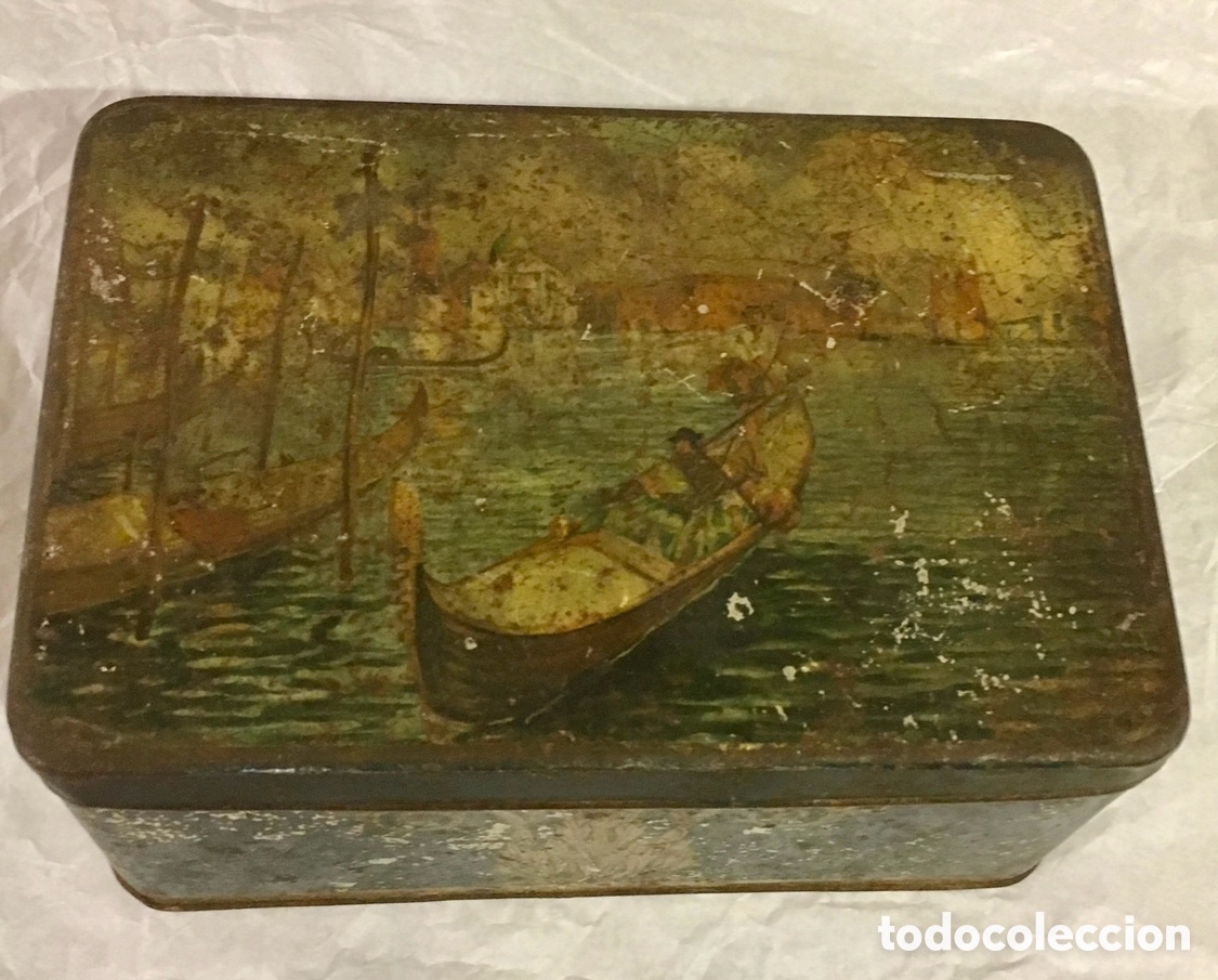 Bo&icirc;tes et petites bo&icirc;tes m&eacute;talliques: Caja met&aacute;lica antigua.