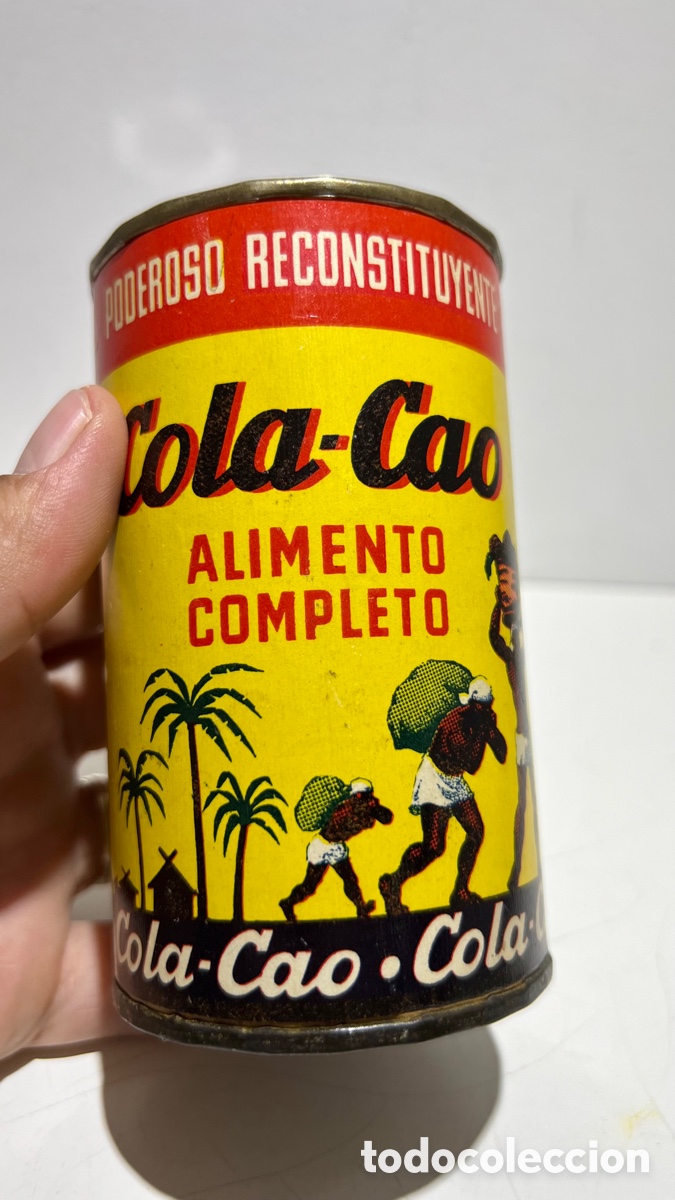Cajas y cajitas met&aacute;licas: ANTIGUA JOYA BOTE DE COLA CAO 200 GR PRIMER MODELO PALMERAS AL LADO DE LAS CHOZAS MUY BUEN ESTADO
