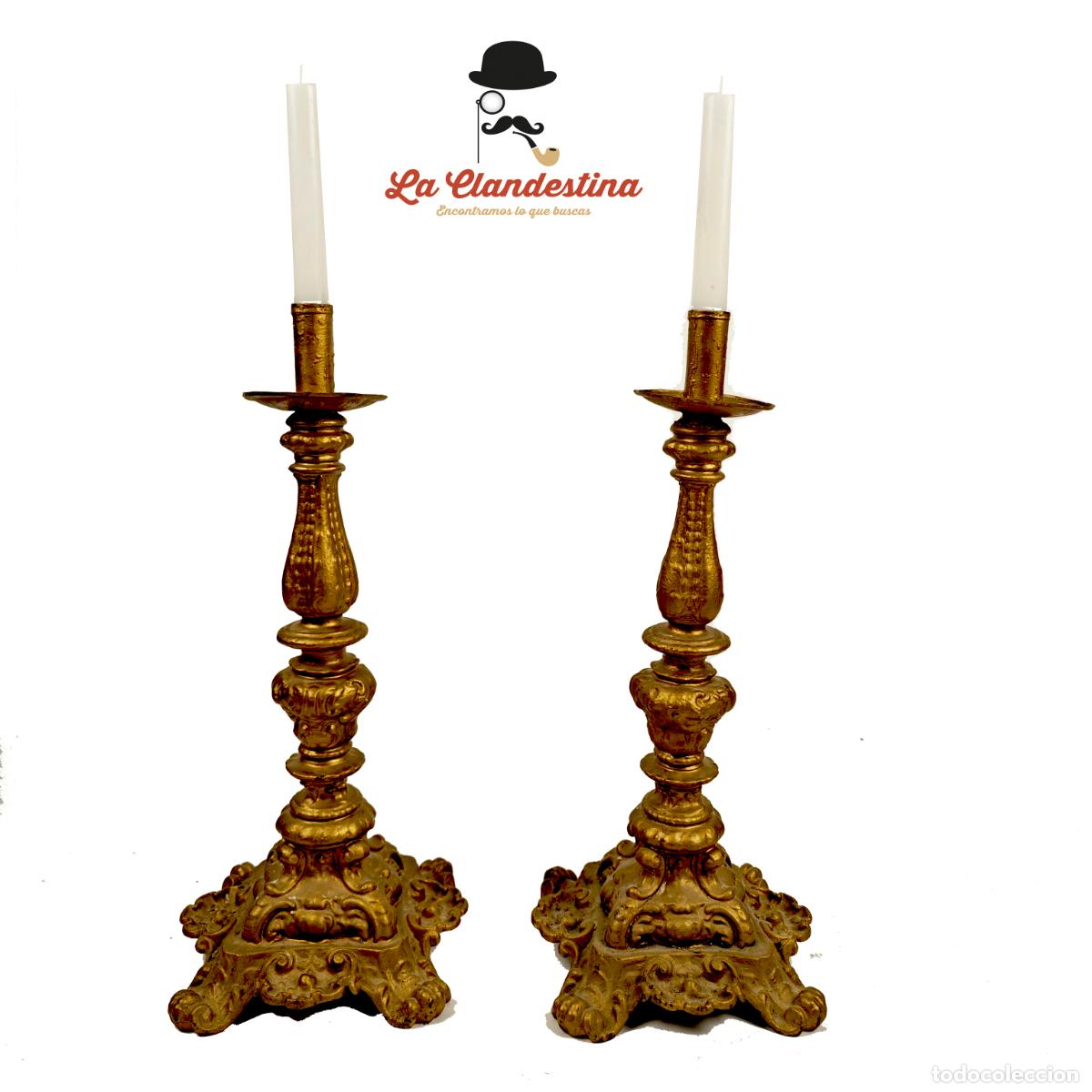 Boxes and metal boxes: Antigua pareja de candelabros de altar. Hierro dorado. 40 cm. de alto. Siglo XVIII-XIX.