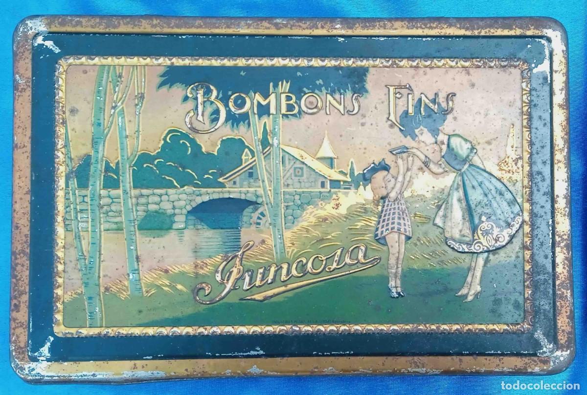 Bo&icirc;tes et petites bo&icirc;tes m&eacute;talliques: CAJA MET&Aacute;LICA BOMBONS FINS JUNCOSA. CHOCOLATE JUNCOSA, SIN FECHA.