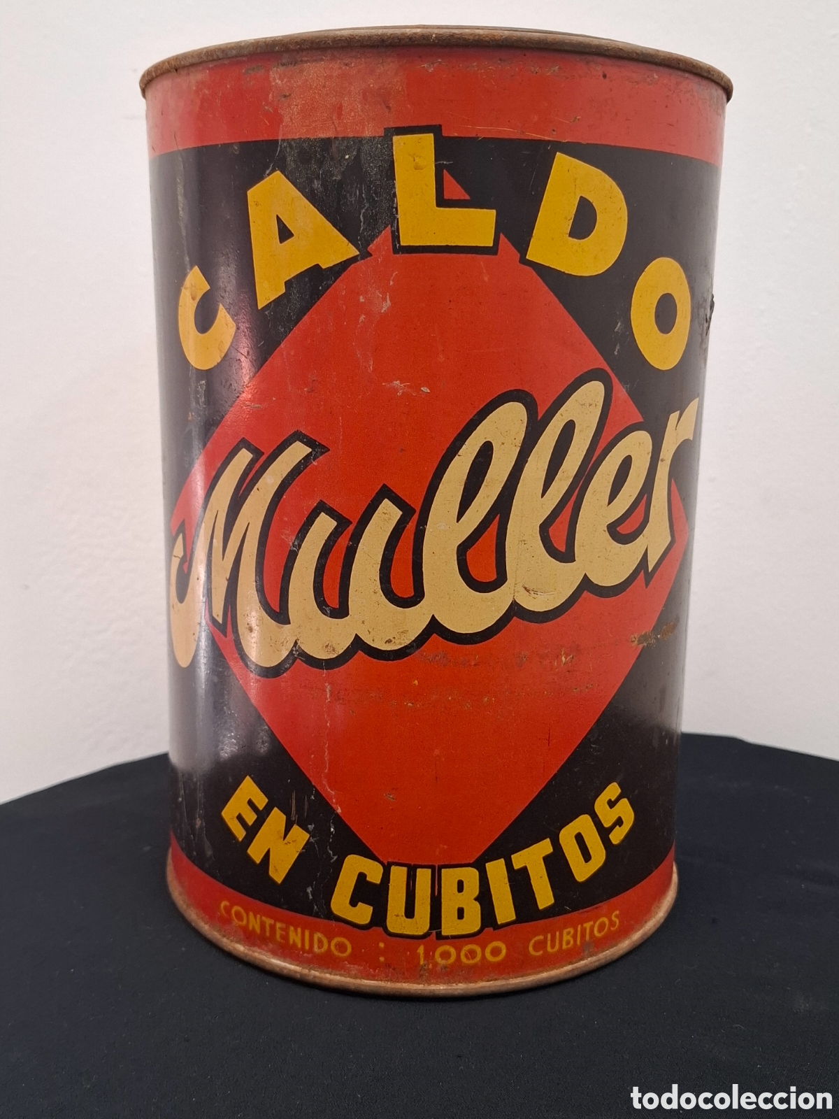 Bo&icirc;tes et petites bo&icirc;tes m&eacute;talliques: Lata Muller caldo en cubitos. Art&iacute;culo de comercio. &Uacute;nica.