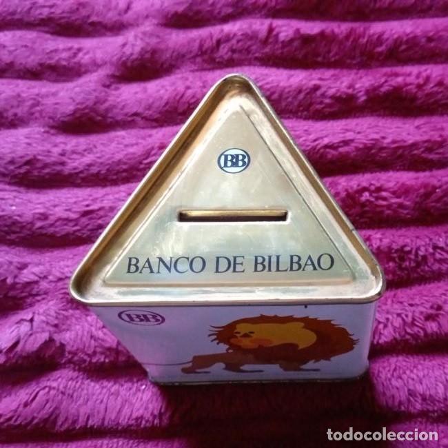 Cajas y cajitas met&aacute;licas: HUCHA DEL BANCO DE BILBAO TRIANGULAR NUEVA SIN USAR - Foto 1