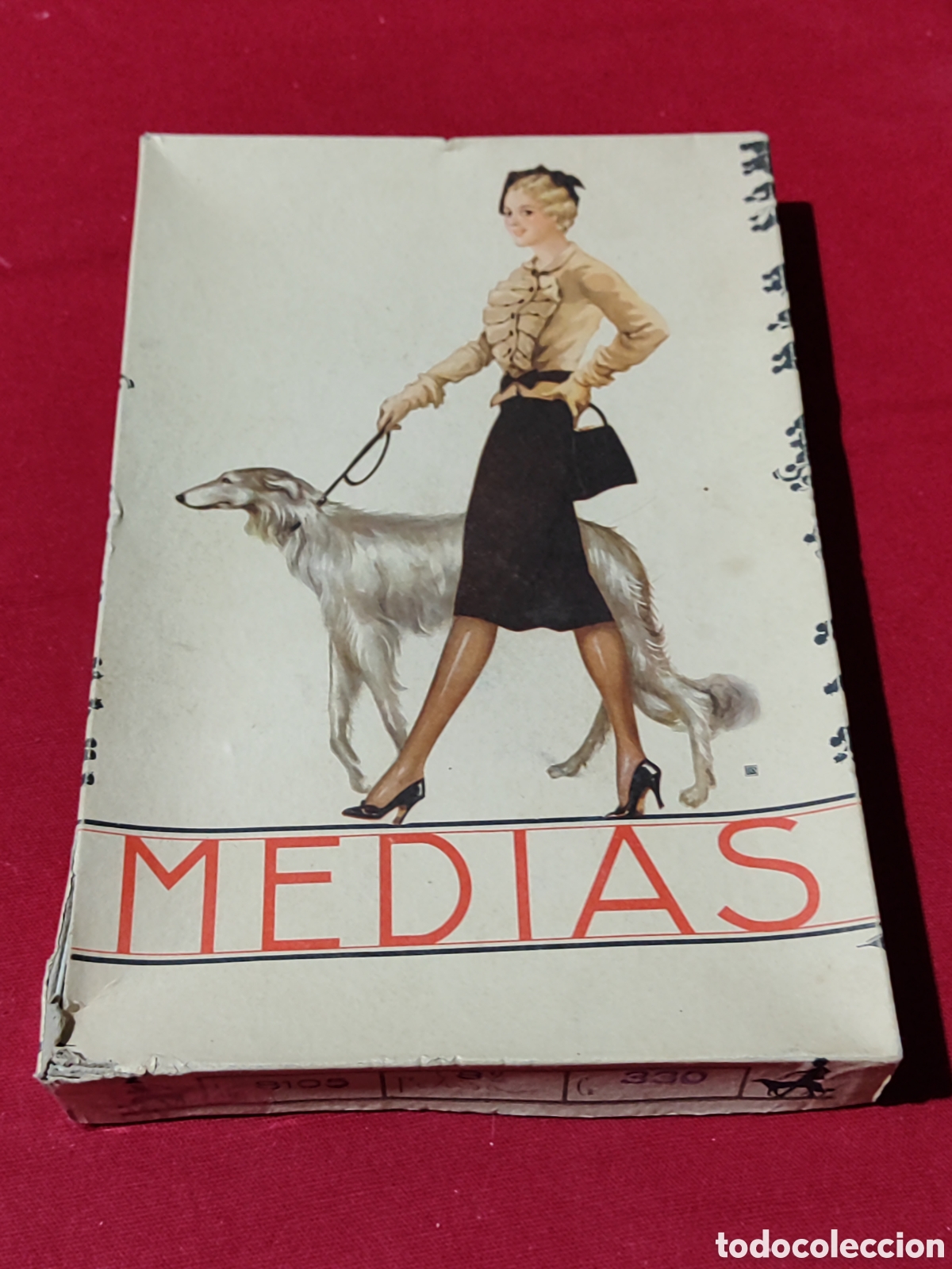 Cajas y cajitas met&aacute;licas: Antigua caja de medias con original dibujo