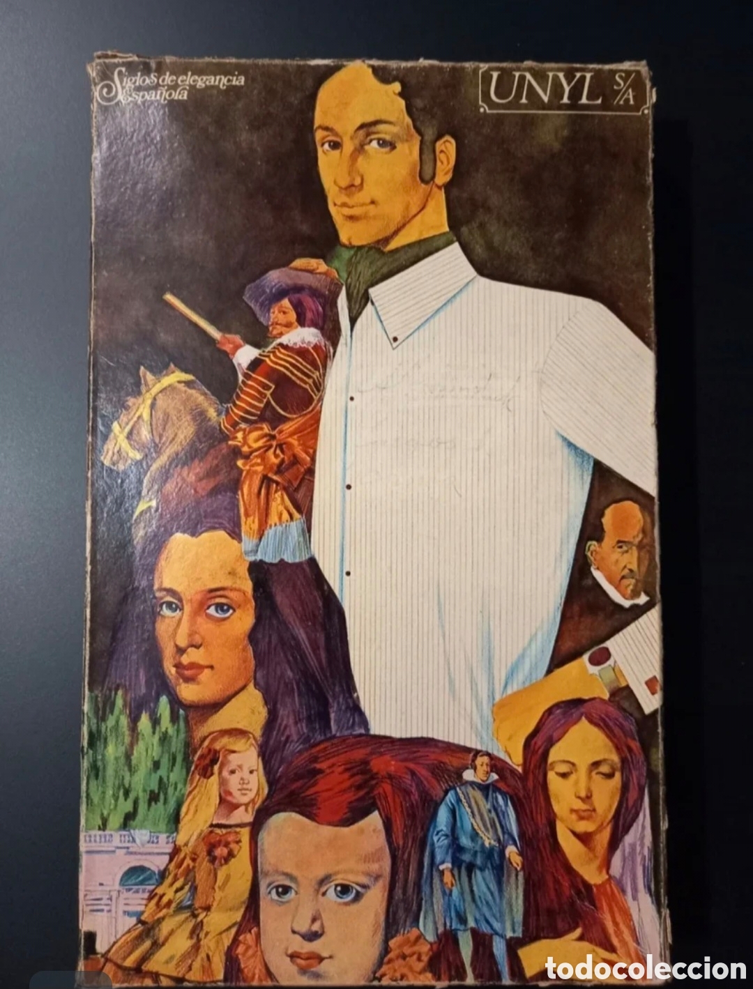 Cajas y cajitas met&aacute;licas: Caja ropa Unyl S/A - Siglos de elegancia espa&ntilde;ola