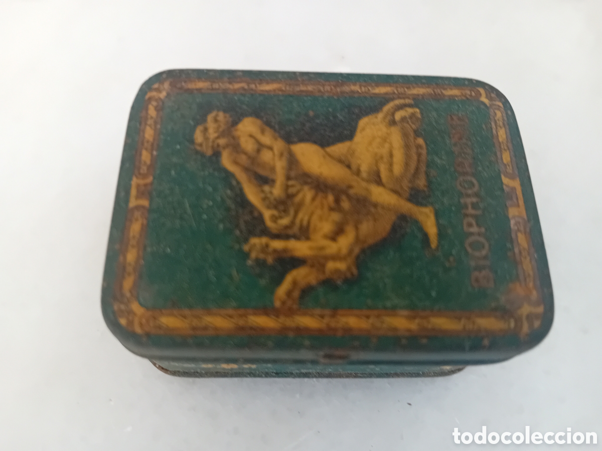 Cajas y cajitas met&aacute;licas: Antigua caja de hojalata litografiada con publicidad de Biophorine