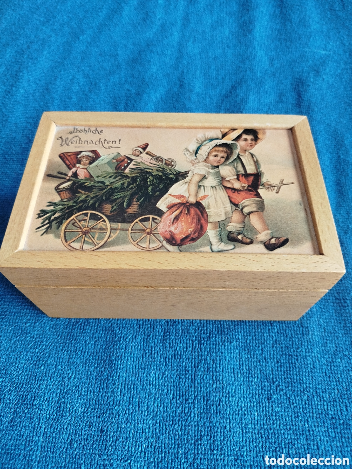 Cajas y cajitas met&aacute;licas: Caja de madera musical con leyenda fr&ouml;hliche weihnachten (feliz navidad) en alem&aacute;n.