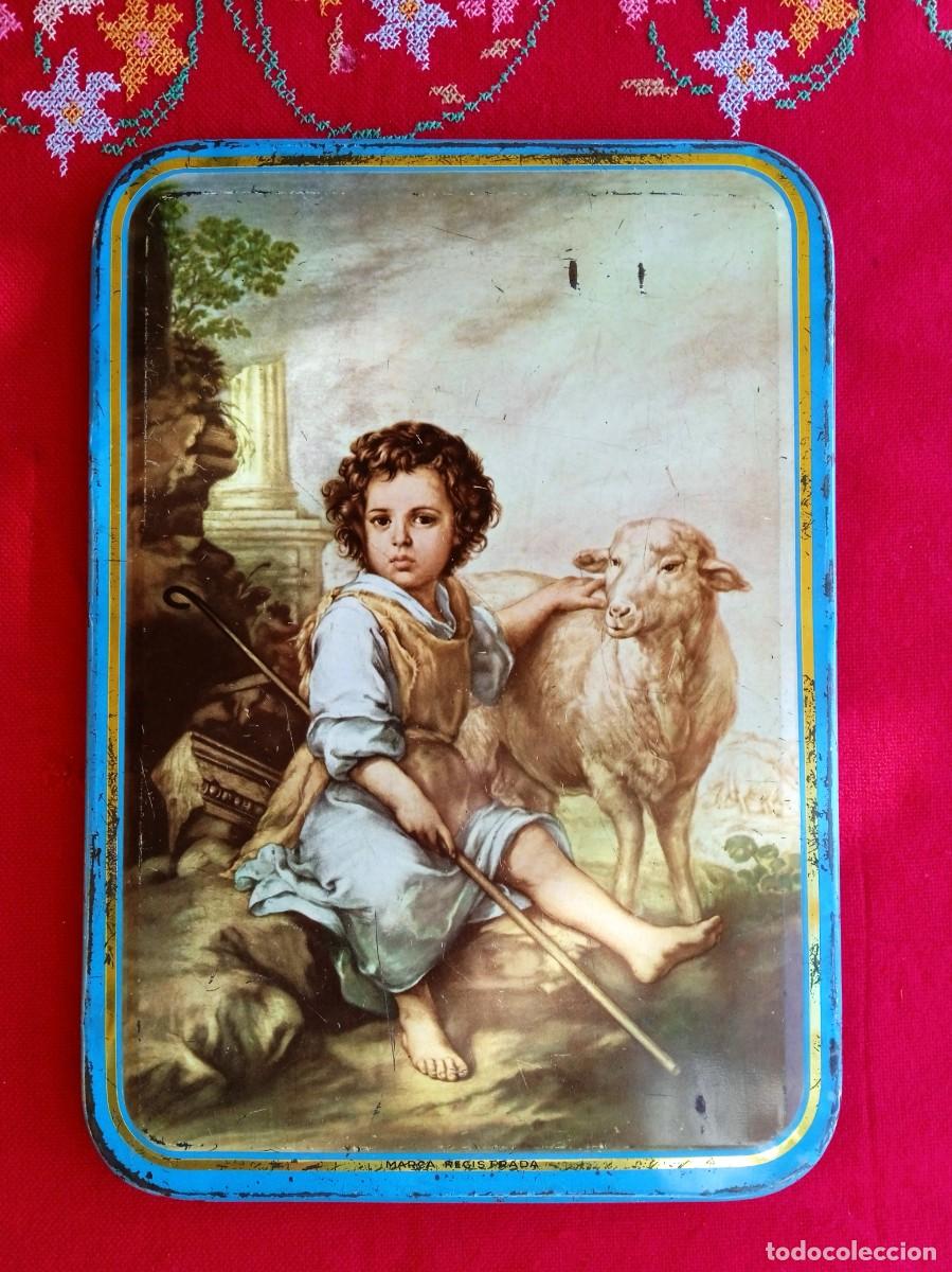 Cajas y cajitas met&aacute;licas: Tapadera de caja de lata antigua de membrillo con serigraf&iacute;a religiosa de San Juanito