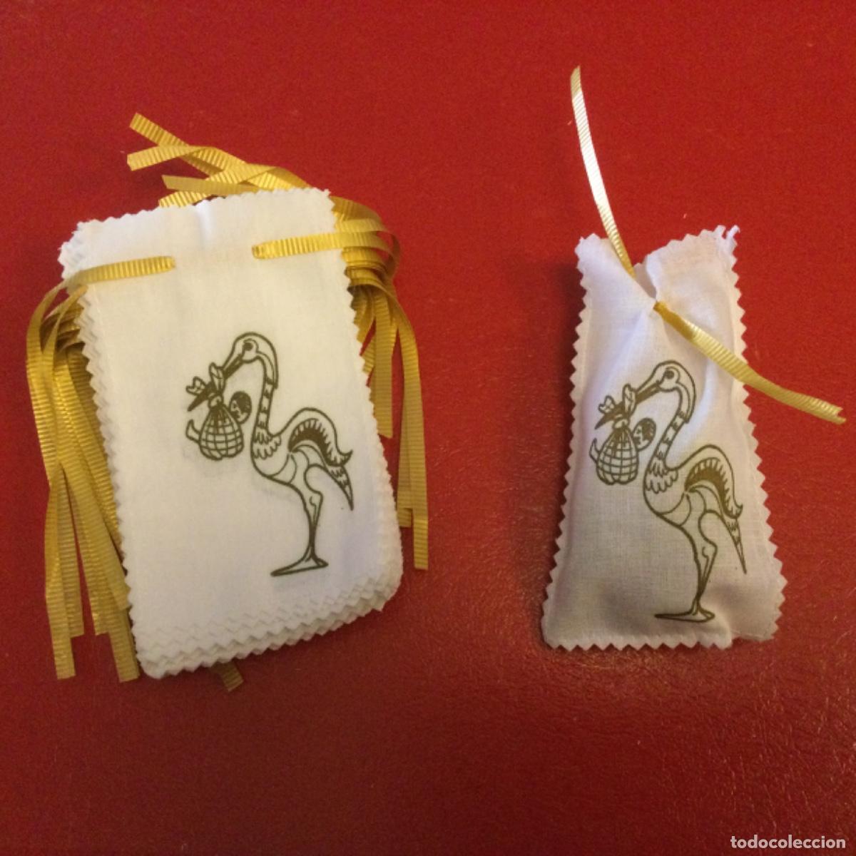 Cajas y cajitas met&aacute;licas: Bolsitas de tela para nacimientos. (Lote de 25)
