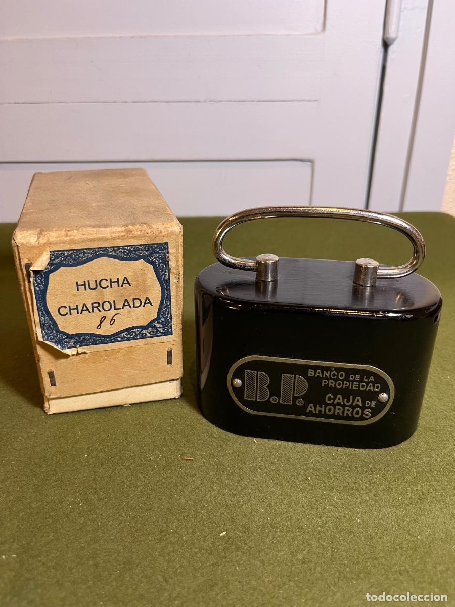 Cajas y cajitas met&aacute;licas: Hucha Met&aacute;lica Banco de la Propiedad Caja de Ahorros B.P. Negra con Caja Original Vintage
