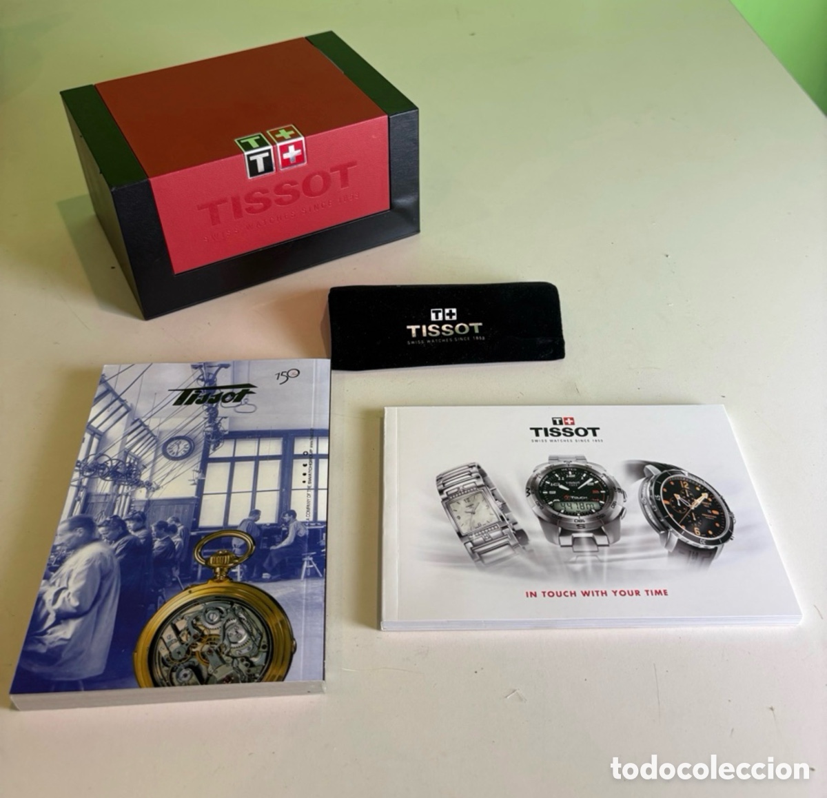Bo&icirc;tes et petites bo&icirc;tes m&eacute;talliques: Caja original Tissot Swiss Made con documentaci&oacute;n, estuche y soporte expositor &ndash; Set completo