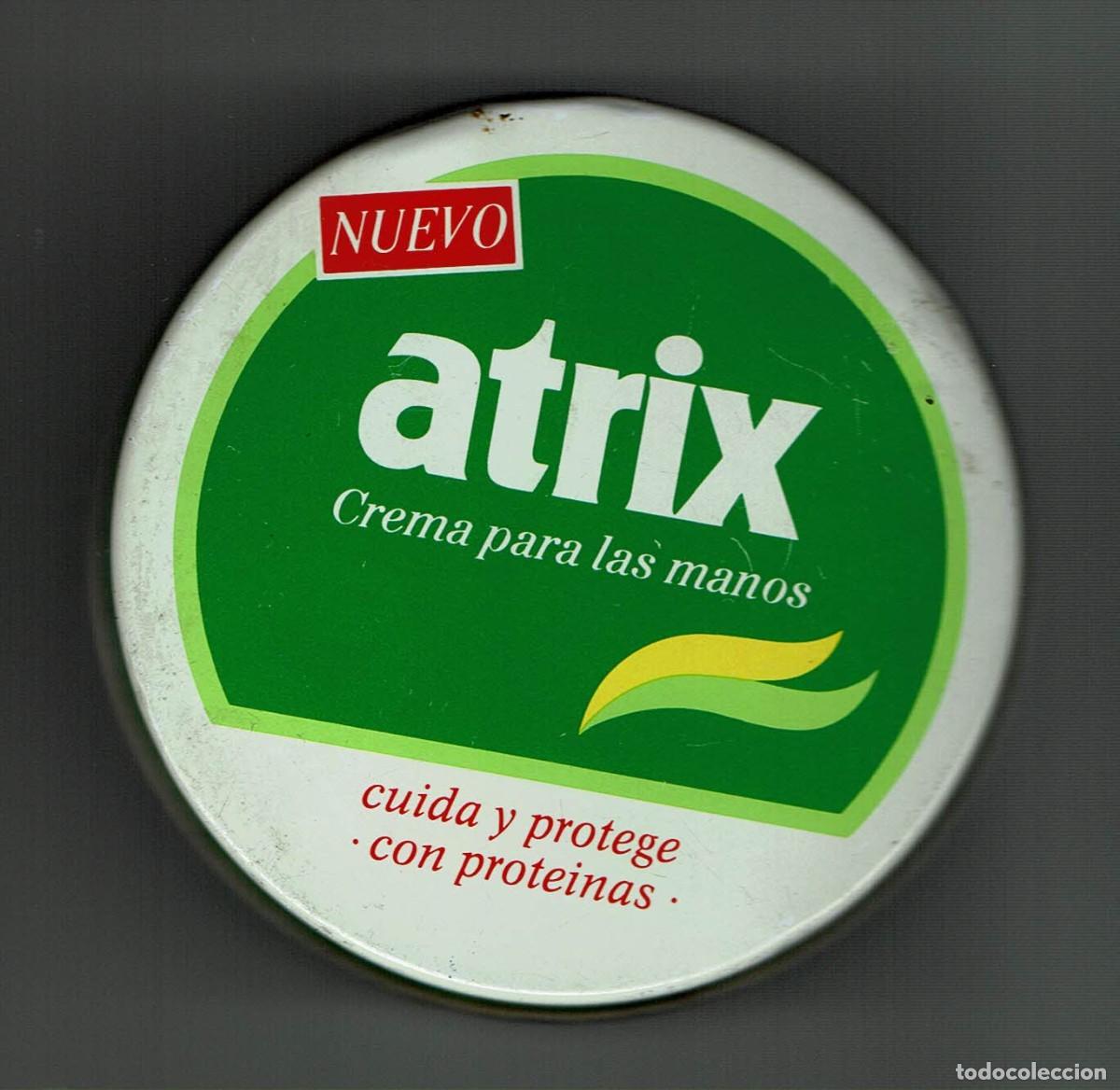Cajas y cajitas met&aacute;licas: Atrix / Crema para las manos / Cuida y protege con prote&iacute;nas / Bote met&aacute;lico / Vac&iacute;o
