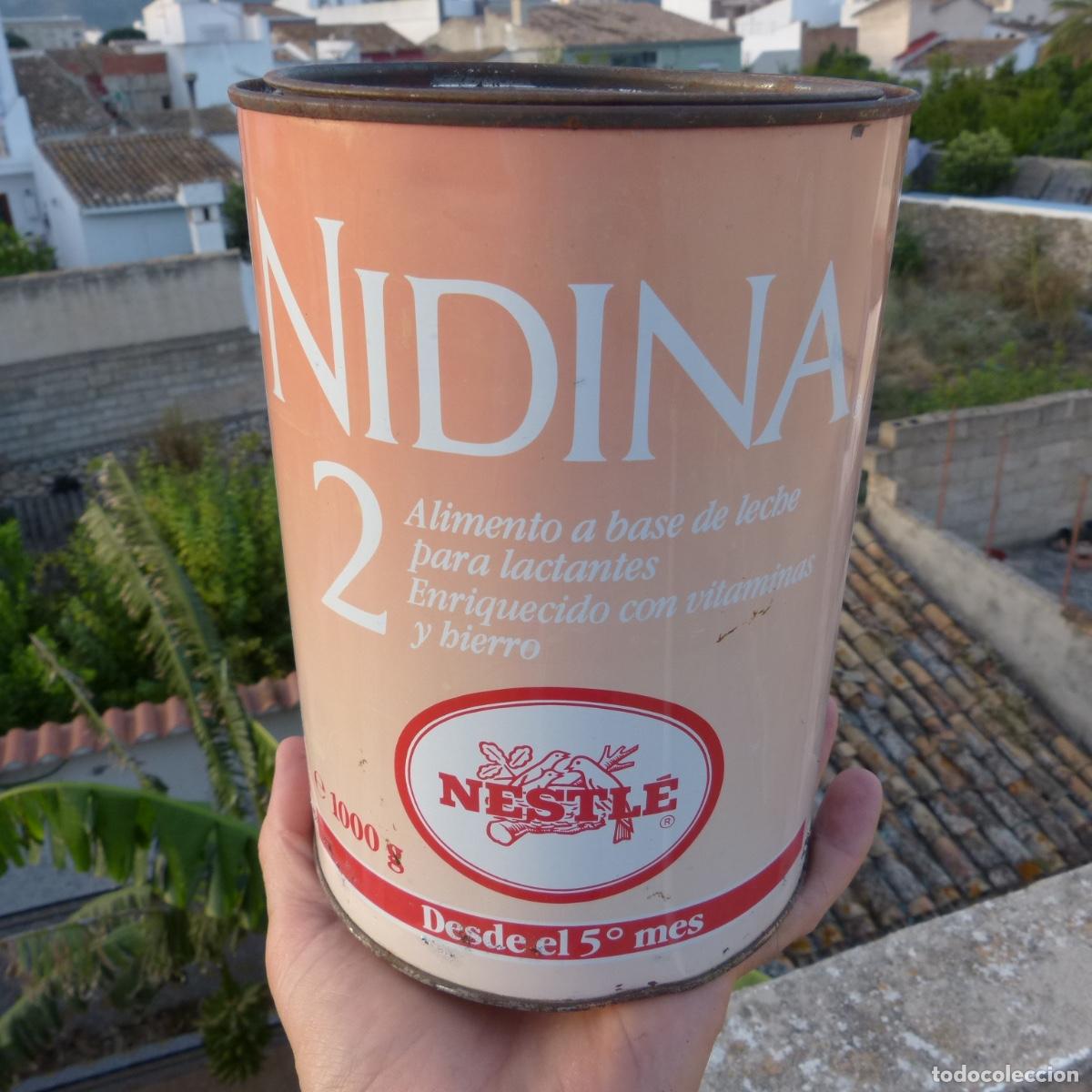 Cajas y cajitas met&aacute;licas: Antiguo bote de leche en polvo infantil, nidina 2 de nestle, 1993, 1760ptas, 1000gr, vacio.