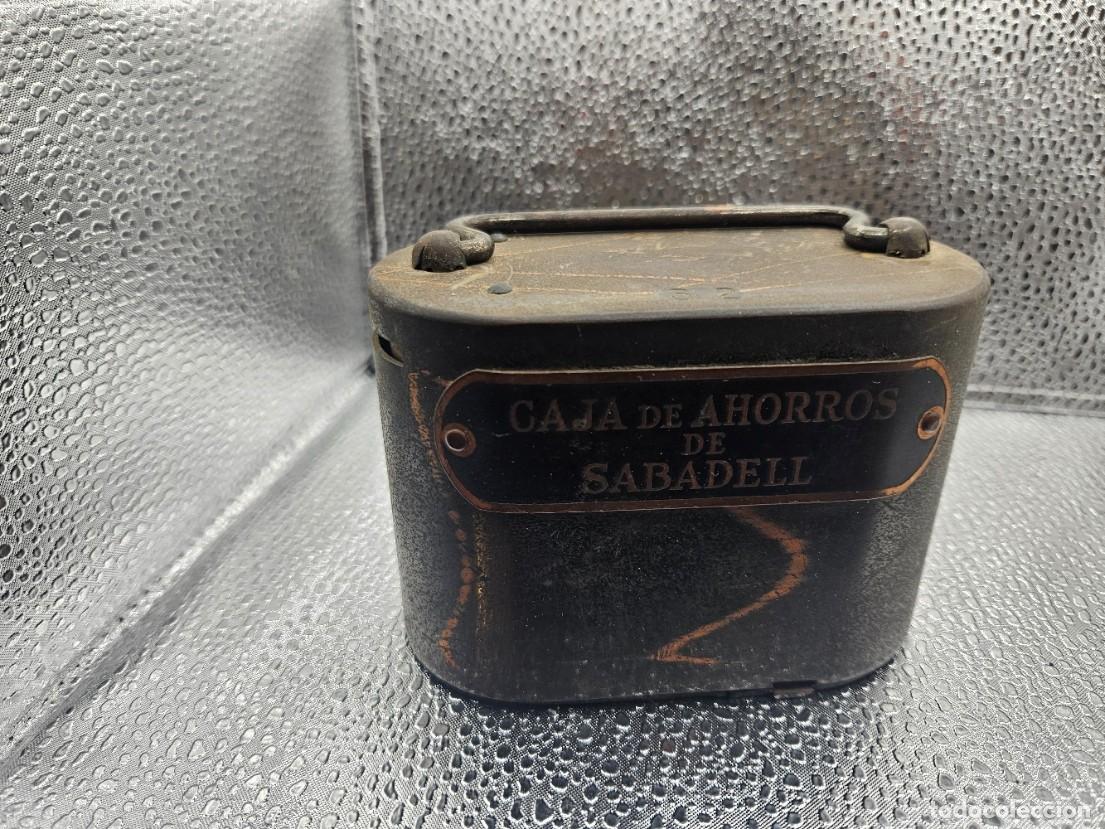 Cajas y cajitas met&aacute;licas: CAJITA DE AHORRO CAJA DE AHORROS DE SABADELL