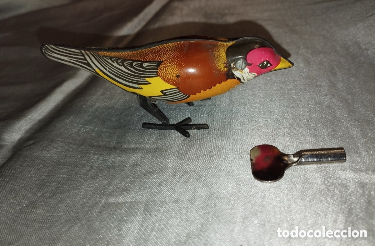 Cajas y cajitas met&aacute;licas: P&aacute;jaro de hojalata a cuerda con llave (12,5 x 5 cm)