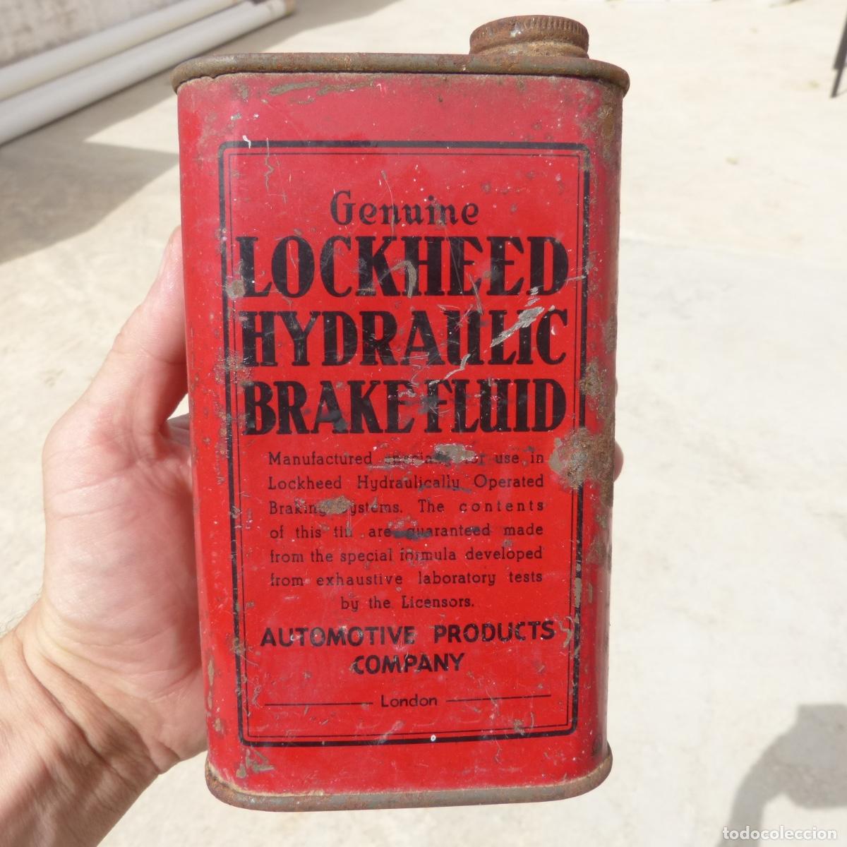 Cajas y cajitas met&aacute;licas: Antigua lata de aceite o liquido de frenos, lockheed hidraulic brake fluid, automotive products.