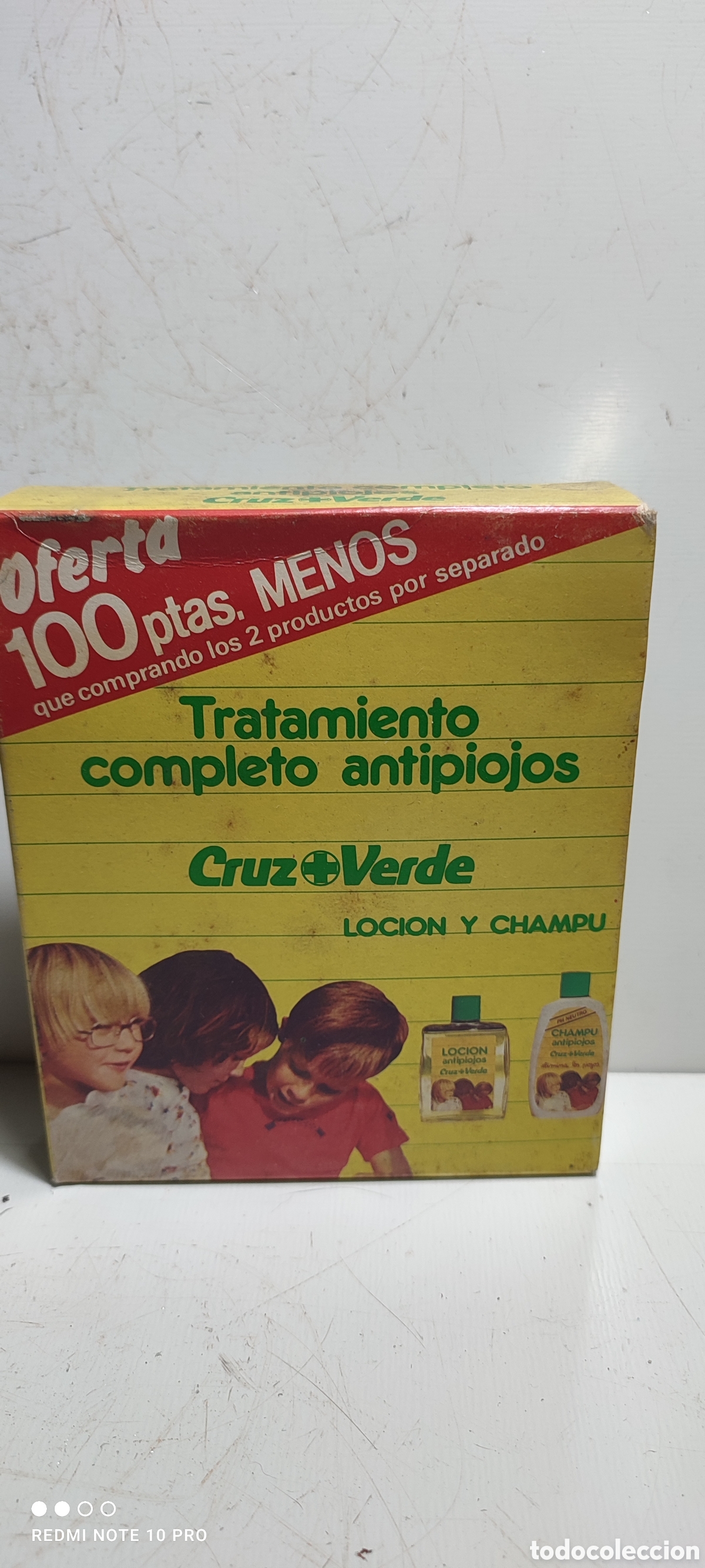 Cajas y cajitas met&aacute;licas: Antigua caja Cruz Verde, tratamiento completo antipiojos, producto en caja de una vieja drogueria.