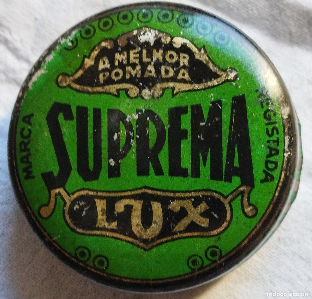 Casse e cassette metalliche: Antigua caja met&aacute;lica redonda SUPREMA LUX y A MELHOR POMADA - Porto (Portugal)