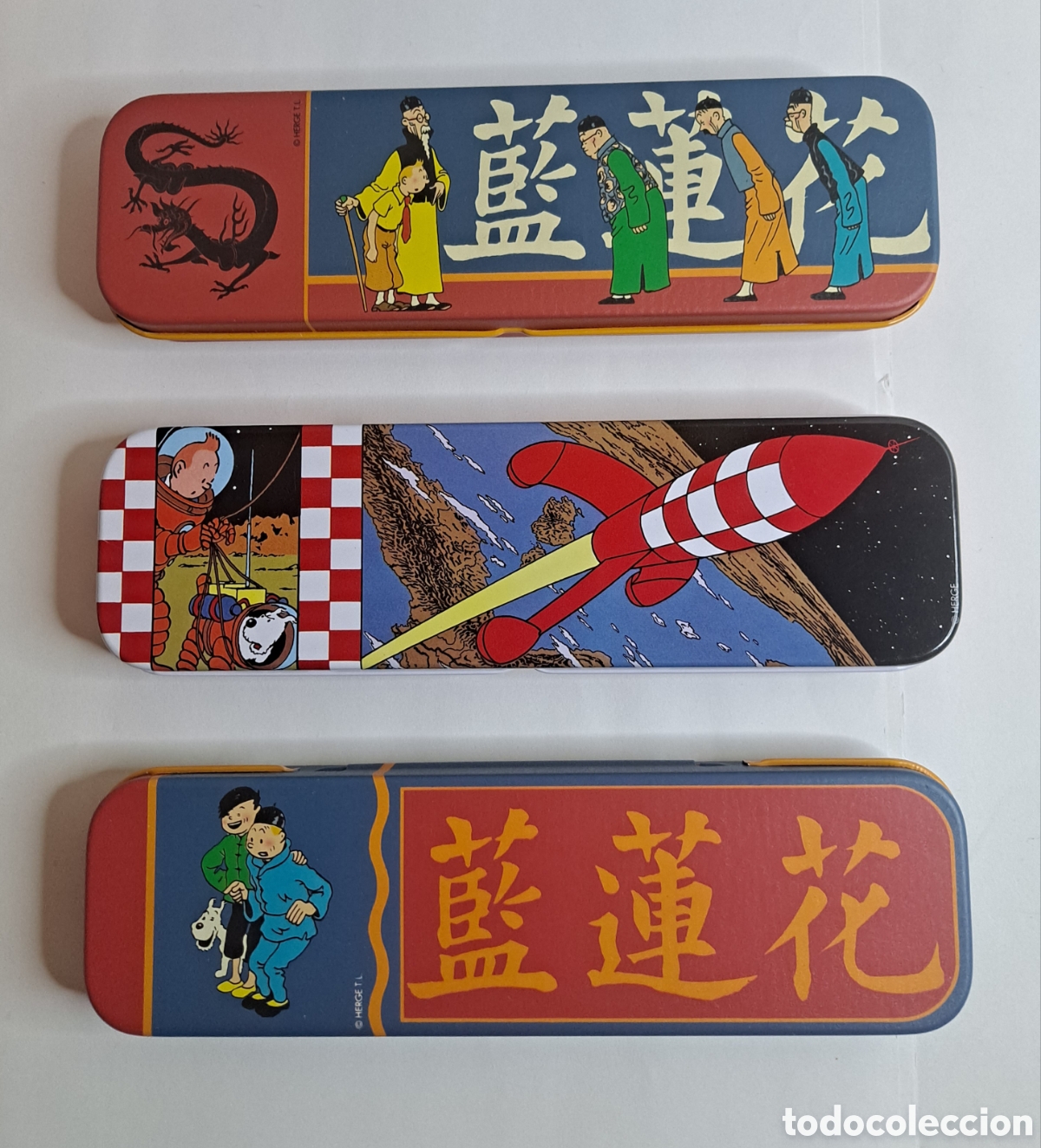 Caixas e caixinhas met&aacute;licas: LOTE TINTIN 3 ESTUCHES. NUEVOS. LATA. MET&Aacute;LICOS. EL LOTO AZUL. OBJETIVO LA LUNA. PLUMIER. 22 CM.