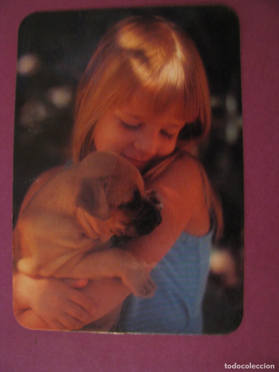 Coleccionismo calendarios: CALENDARIO DE BOLSILLO. IMAGEN UNA NI&Ntilde;A CON PERRITO. PUBL. PANADERIA CONFITERIA REMEDIOS MALAGA 1991