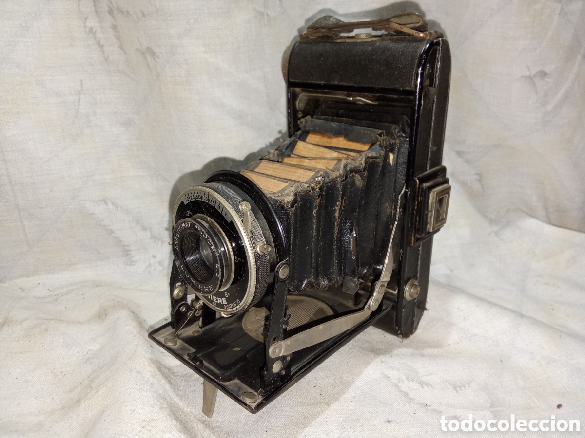 C&aacute;mara de fotos: ANTIGUA C&Aacute;MARA DE FUELLE LUMIERE