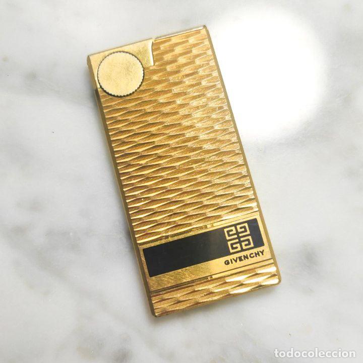 Photo camera: Mechero Zippo Givenchy vintage ba&ntilde;ado en oro