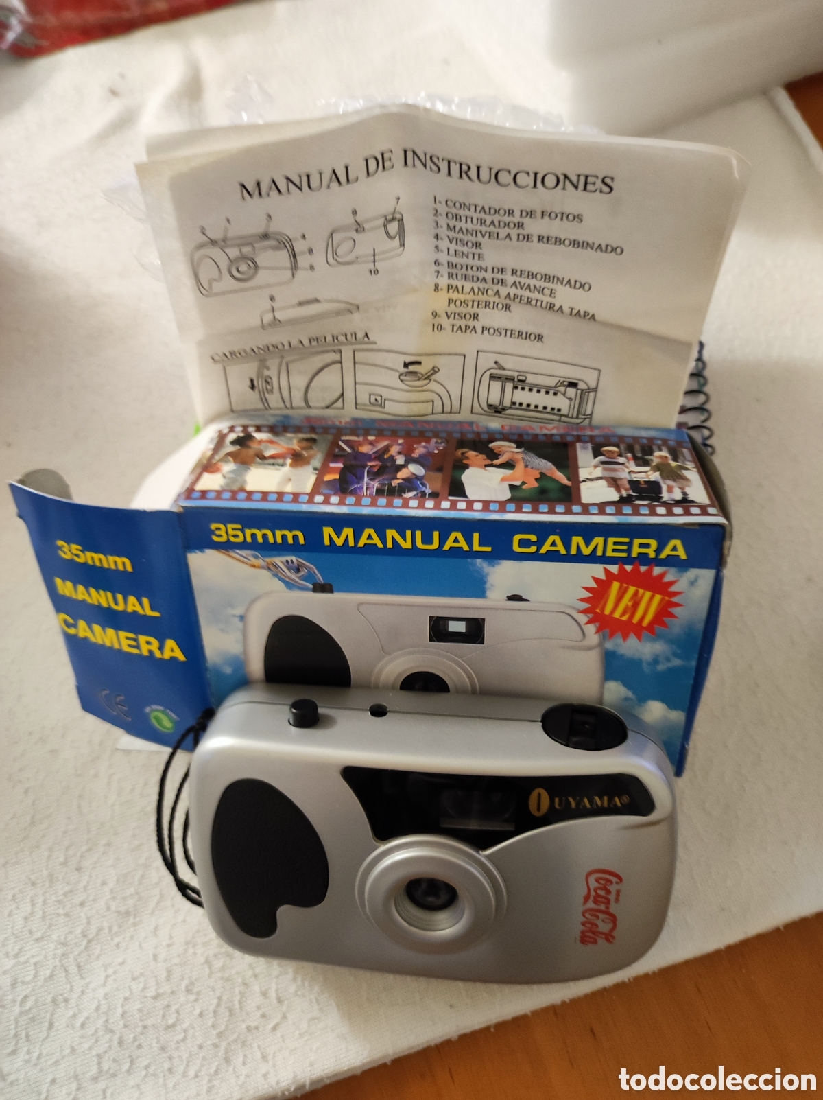 C&aacute;mara de fotos: C&aacute;mara manual publicidad Coca-Cola a&ntilde;os 2000 aprox