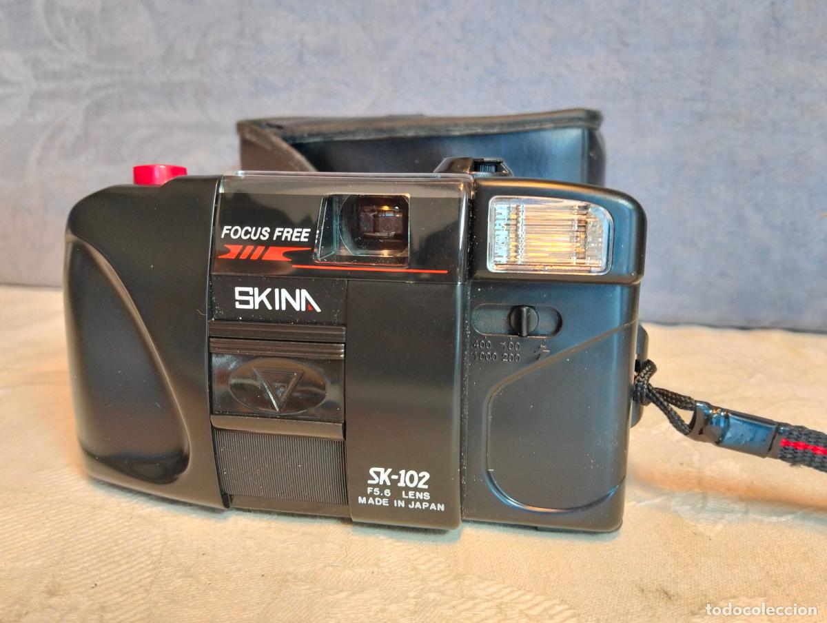 Fotokamera: C&aacute;mara fotogr&aacute;fica antigua skina focus free sk-102 f5.6 lens made in Japan con funda negra