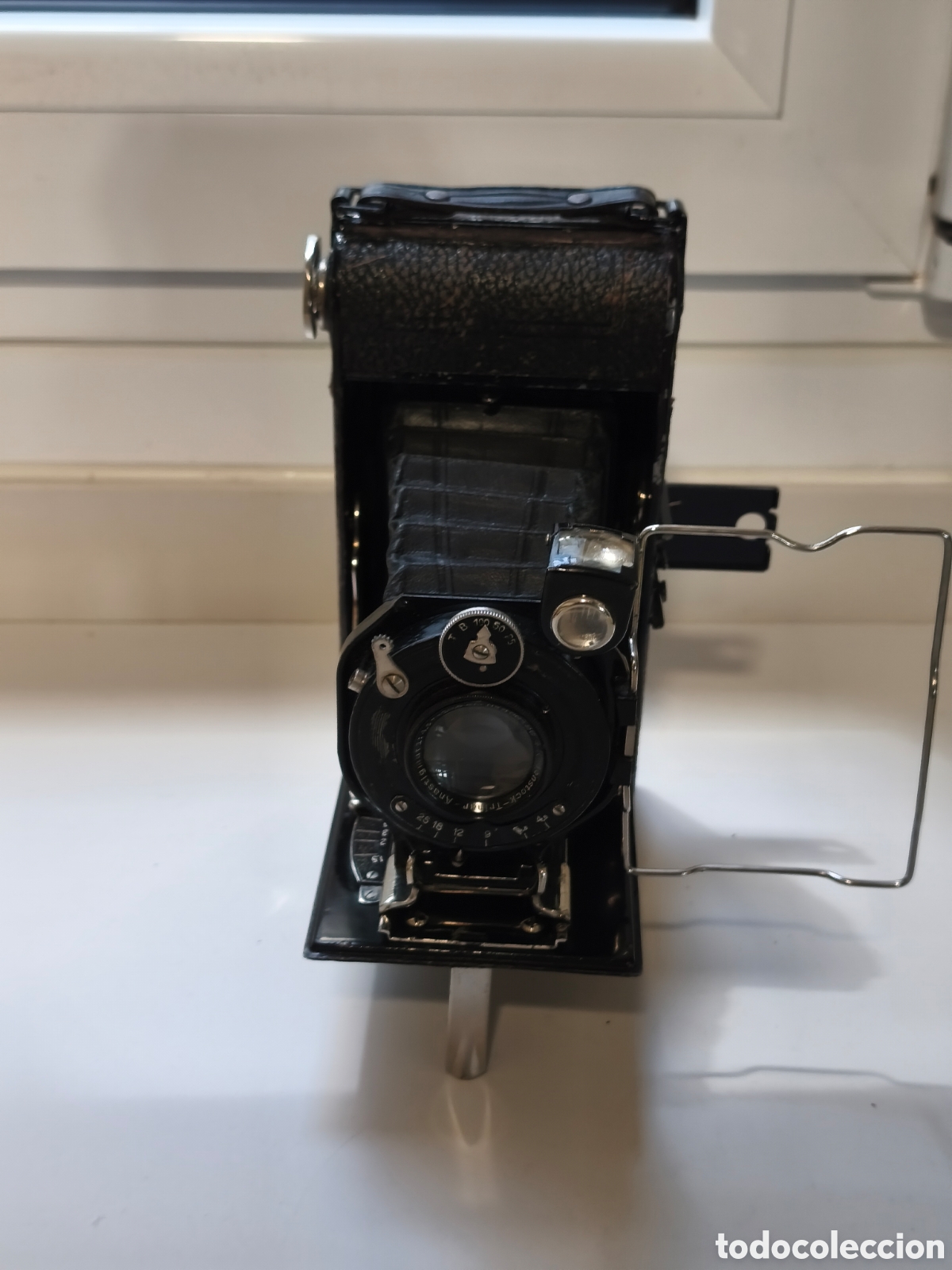 Fotokamera: C&aacute;mara de fuelle marca desconocida