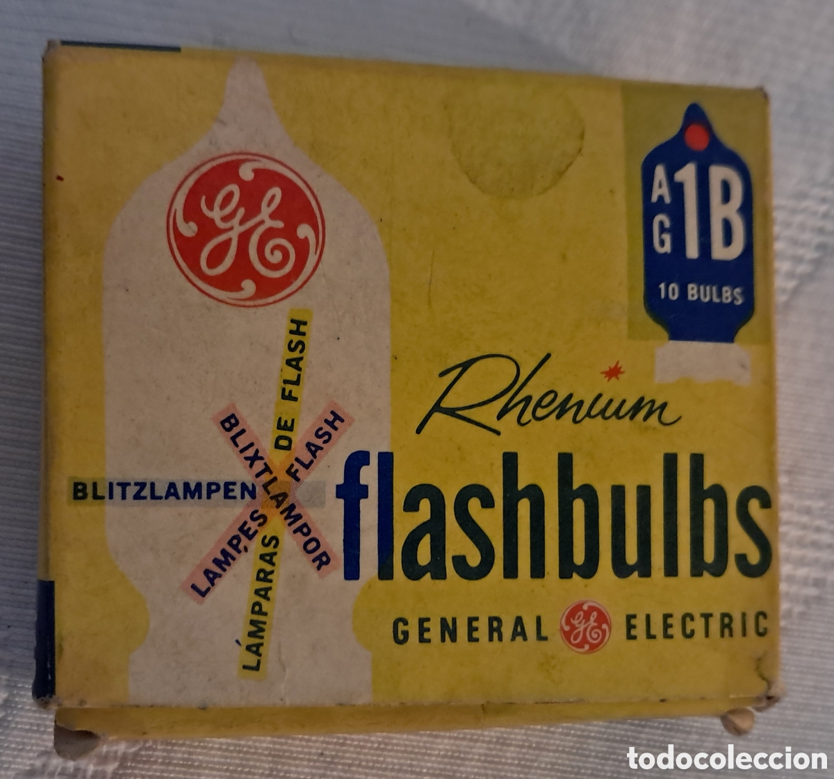 C&aacute;mara de fotos: Flashbulbs. Cajita con varias lamparitas azules. De General Electrics