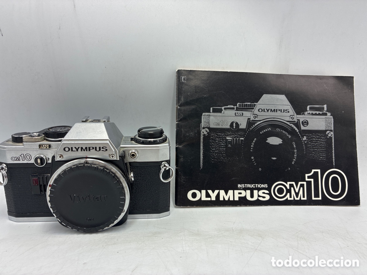 C&aacute;mara de fotos: C&aacute;mara OLYMPUS OM-10. Libro de instrucciones.
