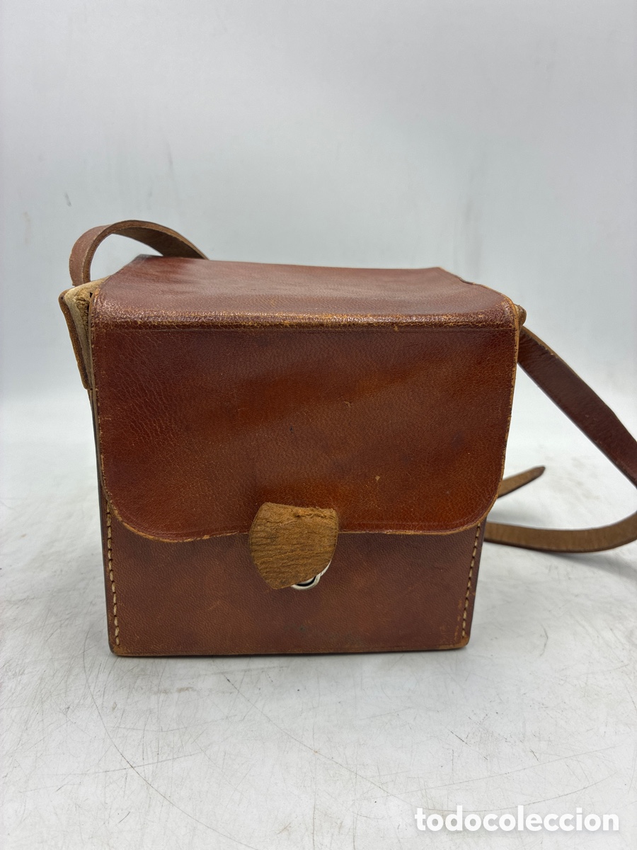 C&aacute;mara de fotos: Funda estuche de cuero para c&aacute;mara de fotos.
