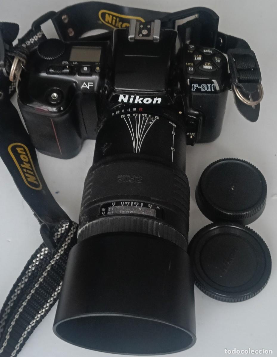 C&aacute;mara de fotos: CAMARA FOTOGRAFICA NIKON AF OBJETIVO SIGMA PROBLEMA DE CIERRE DE LA TAPA