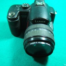 Cámara de fotos: LUMIX PANASONIC DMC-FZ50-12X-35MM-420 EQUIVALENTE-OBJETIVO LEICA-FLASH-MADE IN JAPAN.